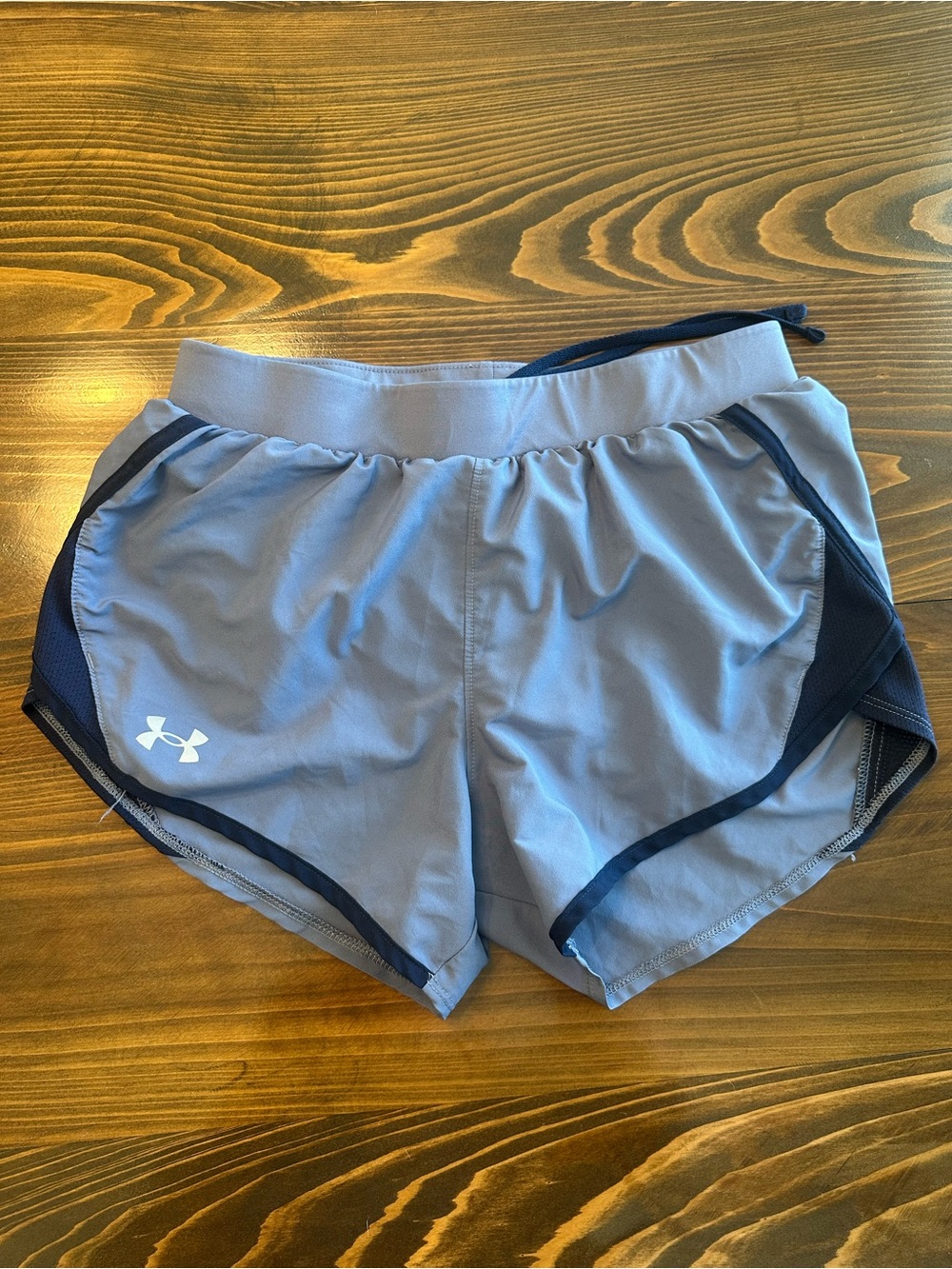Under Armour Women's Light Blue Athletic Shorts with Navy Trim